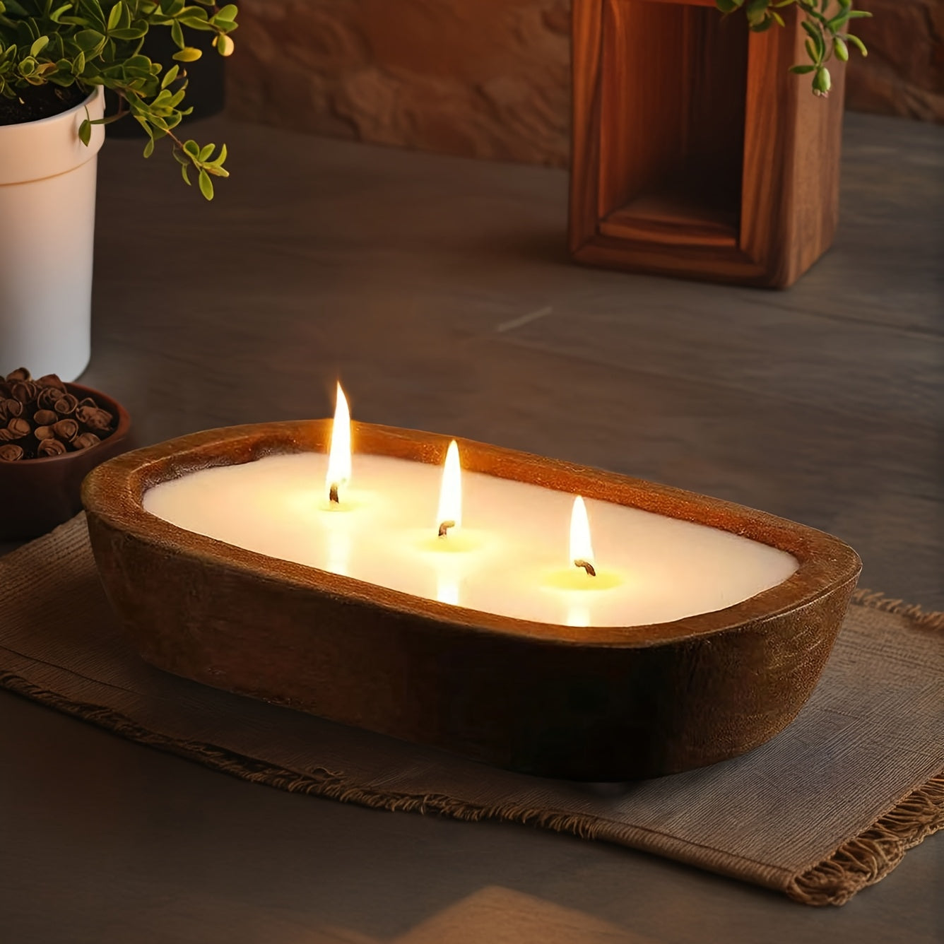 Vela aromática en contenedor de madera en forma de barco