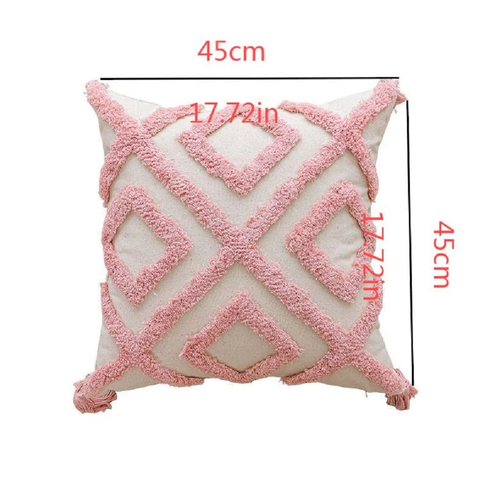 Funda de cojín capitoné con borlas estilo boho